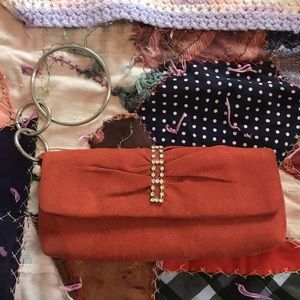 Vintage pumpkin clutch